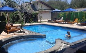 Coral Beach Pizza Cottages